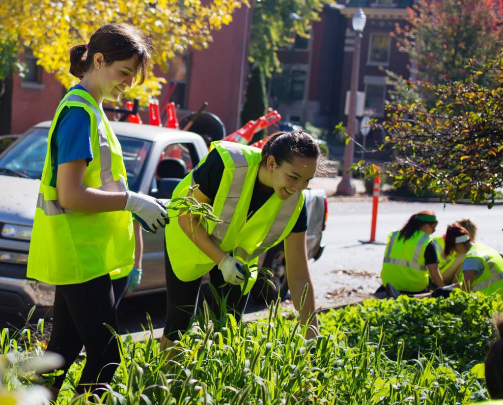 Helping others: Students participate in Make a Difference Day by volunteering throughout the city of St. Louis. Andrew Trinh / Contributor