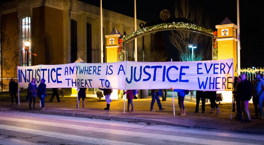 Taking it to the streets: Protesters demonstrated along Grand Ave. the night of Monday, Nov. 24.  Javier Muro de Nadal / Staff Photographer